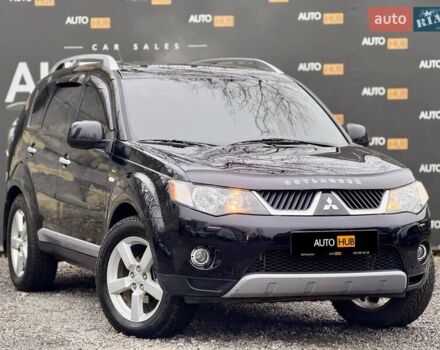 Черный Мицубиси Аутлендер ХЛ, объемом двигателя 3 л и пробегом 214 тыс. км за 9500 $, фото 1 на Automoto.ua