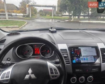 Черный Мицубиси Аутлендер ХЛ, объемом двигателя 2.36 л и пробегом 87 тыс. км за 11500 $, фото 10 на Automoto.ua