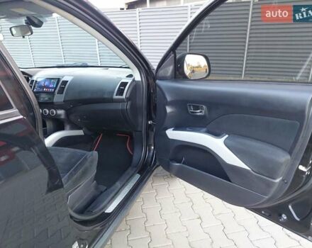 Чорний Міцубісі Аутлендер ХЛ, об'ємом двигуна 2.4 л та пробігом 181 тис. км за 8990 $, фото 13 на Automoto.ua