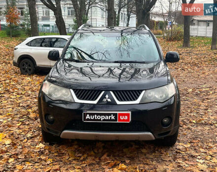 Черный Мицубиси Аутлендер ХЛ, объемом двигателя 3 л и пробегом 285 тыс. км за 9590 $, фото 1 на Automoto.ua