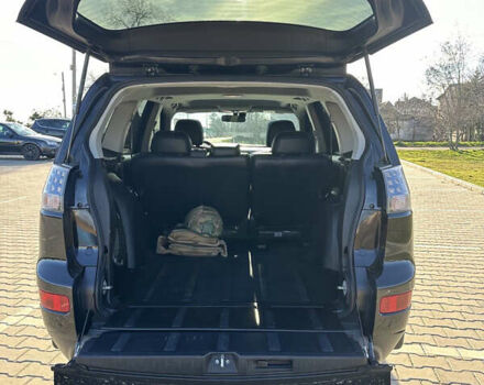 Черный Мицубиси Аутлендер ХЛ, объемом двигателя 2.4 л и пробегом 198 тыс. км за 11000 $, фото 10 на Automoto.ua