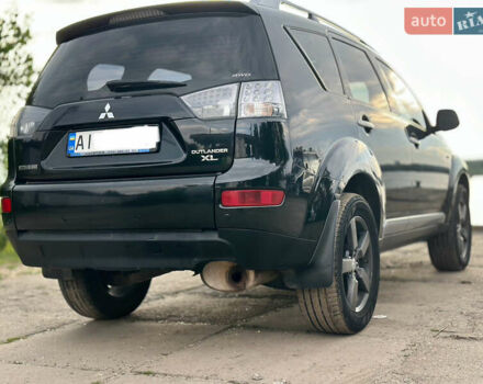Черный Мицубиси Аутлендер ХЛ, объемом двигателя 2.4 л и пробегом 212 тыс. км за 9350 $, фото 39 на Automoto.ua