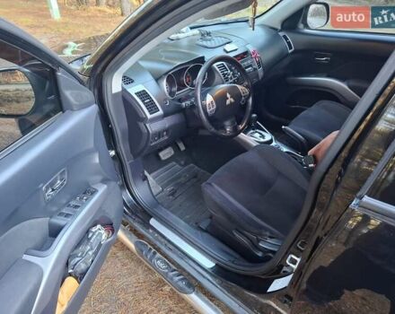 Черный Мицубиси Аутлендер ХЛ, объемом двигателя 2.4 л и пробегом 127 тыс. км за 10500 $, фото 18 на Automoto.ua