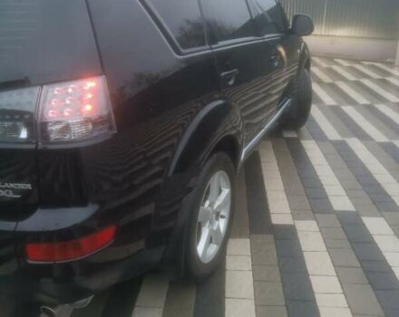 Черный Мицубиси Аутлендер ХЛ, объемом двигателя 2.36 л и пробегом 270 тыс. км за 9200 $, фото 5 на Automoto.ua