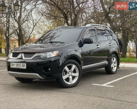 Черный Мицубиси Аутлендер ХЛ, объемом двигателя 3 л и пробегом 154 тыс. км за 8900 $, фото 1 на Automoto.ua