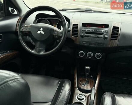 Черный Мицубиси Аутлендер ХЛ, объемом двигателя 2.36 л и пробегом 175 тыс. км за 9700 $, фото 22 на Automoto.ua