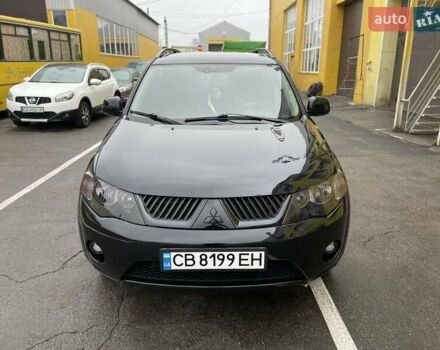 Черный Мицубиси Аутлендер ХЛ, объемом двигателя 2.4 л и пробегом 198 тыс. км за 9200 $, фото 7 на Automoto.ua