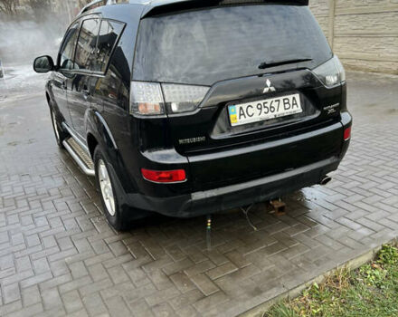 Черный Мицубиси Аутлендер ХЛ, объемом двигателя 2.36 л и пробегом 216 тыс. км за 7500 $, фото 5 на Automoto.ua