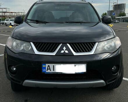 Черный Мицубиси Аутлендер ХЛ, объемом двигателя 2.4 л и пробегом 212 тыс. км за 9350 $, фото 44 на Automoto.ua