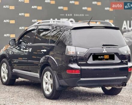 Черный Мицубиси Аутлендер ХЛ, объемом двигателя 3 л и пробегом 214 тыс. км за 9500 $, фото 5 на Automoto.ua
