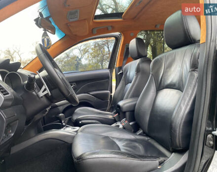 Черный Мицубиси Аутлендер ХЛ, объемом двигателя 3 л и пробегом 154 тыс. км за 8900 $, фото 37 на Automoto.ua