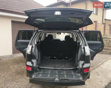 Черный Мицубиси Аутлендер ХЛ, объемом двигателя 2.36 л и пробегом 41 тыс. км за 12000 $, фото 8 на Automoto.ua