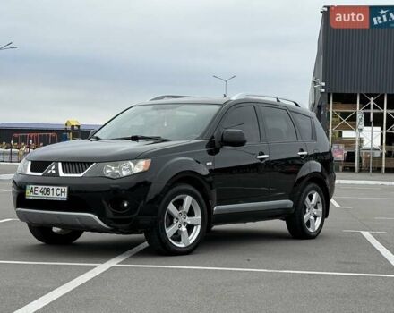 Черный Мицубиси Аутлендер ХЛ, объемом двигателя 2.36 л и пробегом 175 тыс. км за 9700 $, фото 1 на Automoto.ua