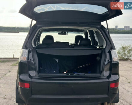 Черный Мицубиси Аутлендер ХЛ, объемом двигателя 2.4 л и пробегом 212 тыс. км за 9350 $, фото 5 на Automoto.ua