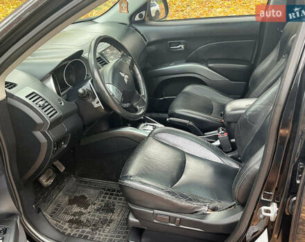 Черный Мицубиси Аутлендер ХЛ, объемом двигателя 3 л и пробегом 285 тыс. км за 9590 $, фото 26 на Automoto.ua