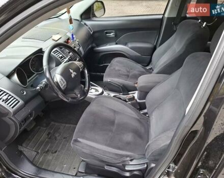 Черный Мицубиси Аутлендер ХЛ, объемом двигателя 2.4 л и пробегом 127 тыс. км за 10500 $, фото 30 на Automoto.ua