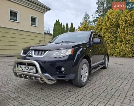 Черный Мицубиси Аутлендер ХЛ, объемом двигателя 2.4 л и пробегом 127 тыс. км за 10500 $, фото 3 на Automoto.ua