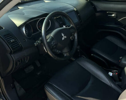 Черный Мицубиси Аутлендер ХЛ, объемом двигателя 2.99 л и пробегом 153 тыс. км за 10800 $, фото 3 на Automoto.ua