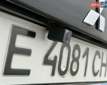 Черный Мицубиси Аутлендер ХЛ, объемом двигателя 2.36 л и пробегом 175 тыс. км за 9700 $, фото 8 на Automoto.ua