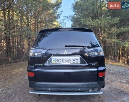 Черный Мицубиси Аутлендер ХЛ, объемом двигателя 2.4 л и пробегом 127 тыс. км за 10500 $, фото 20 на Automoto.ua