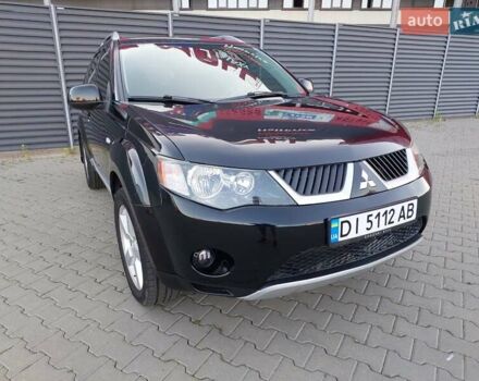 Чорний Міцубісі Аутлендер ХЛ, об'ємом двигуна 2.4 л та пробігом 181 тис. км за 8990 $, фото 1 на Automoto.ua