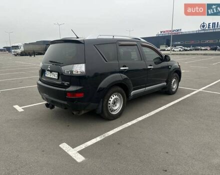 Черный Мицубиси Аутлендер ХЛ, объемом двигателя 2.36 л и пробегом 250 тыс. км за 10000 $, фото 10 на Automoto.ua