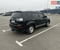 Черный Мицубиси Аутлендер ХЛ, объемом двигателя 2.36 л и пробегом 250 тыс. км за 10000 $, фото 10 на Automoto.ua