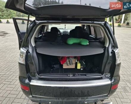 Черный Мицубиси Аутлендер ХЛ, объемом двигателя 2.4 л и пробегом 127 тыс. км за 10500 $, фото 40 на Automoto.ua