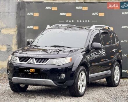Черный Мицубиси Аутлендер ХЛ, объемом двигателя 3 л и пробегом 214 тыс. км за 9500 $, фото 4 на Automoto.ua