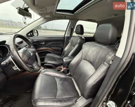 Черный Мицубиси Аутлендер ХЛ, объемом двигателя 2.36 л и пробегом 175 тыс. км за 9700 $, фото 20 на Automoto.ua