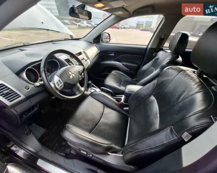 Черный Мицубиси Аутлендер ХЛ, объемом двигателя 2.36 л и пробегом 211 тыс. км за 10500 $, фото 9 на Automoto.ua