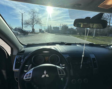 Черный Мицубиси Аутлендер ХЛ, объемом двигателя 2.4 л и пробегом 198 тыс. км за 11000 $, фото 16 на Automoto.ua