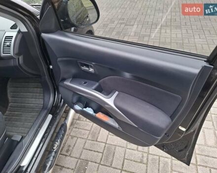 Черный Мицубиси Аутлендер ХЛ, объемом двигателя 2.4 л и пробегом 127 тыс. км за 10500 $, фото 38 на Automoto.ua