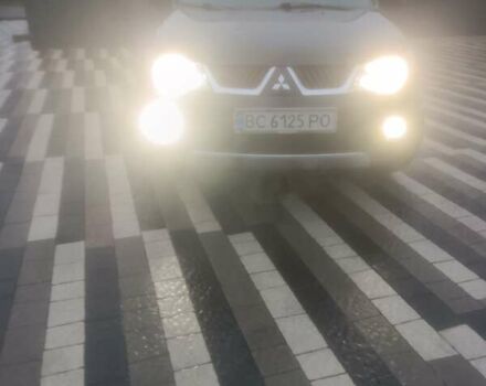 Черный Мицубиси Аутлендер ХЛ, объемом двигателя 2.36 л и пробегом 270 тыс. км за 9200 $, фото 6 на Automoto.ua