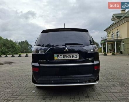 Черный Мицубиси Аутлендер ХЛ, объемом двигателя 2.4 л и пробегом 127 тыс. км за 10500 $, фото 12 на Automoto.ua