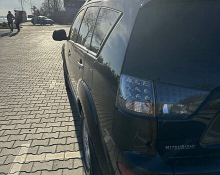 Черный Мицубиси Аутлендер ХЛ, объемом двигателя 2.4 л и пробегом 198 тыс. км за 11000 $, фото 7 на Automoto.ua