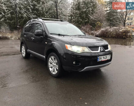 Чорний Міцубісі Аутлендер ХЛ, об'ємом двигуна 2 л та пробігом 306 тис. км за 9799 $, фото 7 на Automoto.ua