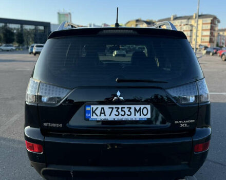 Черный Мицубиси Аутлендер ХЛ, объемом двигателя 2.36 л и пробегом 115 тыс. км за 12000 $, фото 9 на Automoto.ua