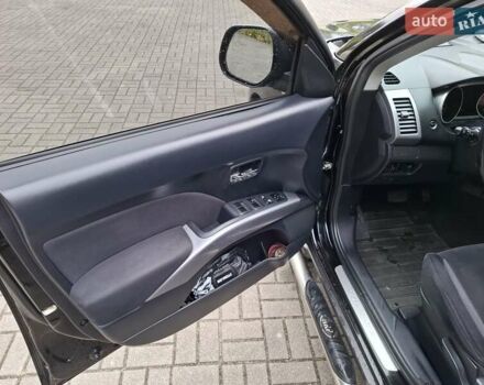 Черный Мицубиси Аутлендер ХЛ, объемом двигателя 2.4 л и пробегом 127 тыс. км за 10500 $, фото 29 на Automoto.ua