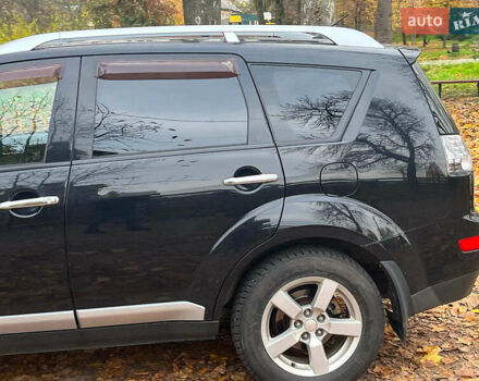 Черный Мицубиси Аутлендер ХЛ, объемом двигателя 3 л и пробегом 285 тыс. км за 9590 $, фото 5 на Automoto.ua