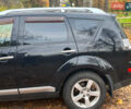 Черный Мицубиси Аутлендер ХЛ, объемом двигателя 3 л и пробегом 285 тыс. км за 9590 $, фото 5 на Automoto.ua