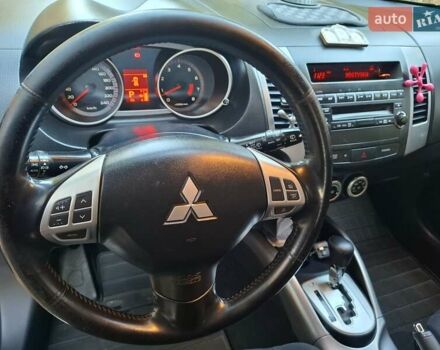 Черный Мицубиси Аутлендер ХЛ, объемом двигателя 2.4 л и пробегом 127 тыс. км за 10500 $, фото 26 на Automoto.ua