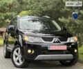 Чорний Міцубісі Аутлендер ХЛ, об'ємом двигуна 2 л та пробігом 172 тис. км за 9350 $, фото 1 на Automoto.ua
