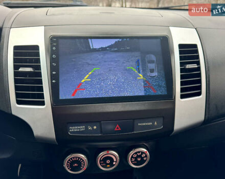 Чорний Міцубісі Аутлендер ХЛ, об'ємом двигуна 2.4 л та пробігом 229 тис. км за 9790 $, фото 22 на Automoto.ua