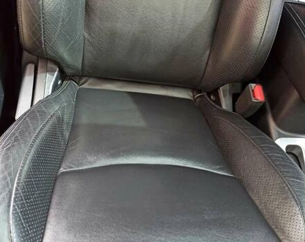 Черный Мицубиси Аутлендер ХЛ, объемом двигателя 2.4 л и пробегом 212 тыс. км за 9350 $, фото 3 на Automoto.ua