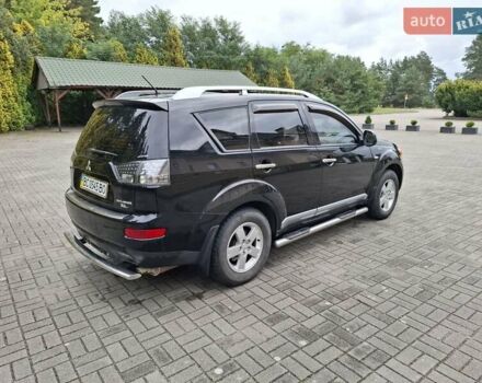 Черный Мицубиси Аутлендер ХЛ, объемом двигателя 2.4 л и пробегом 127 тыс. км за 10500 $, фото 10 на Automoto.ua