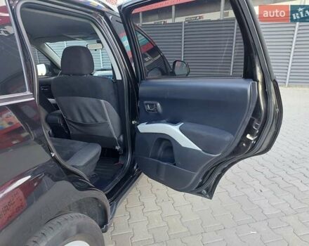 Чорний Міцубісі Аутлендер ХЛ, об'ємом двигуна 2.4 л та пробігом 181 тис. км за 8990 $, фото 14 на Automoto.ua