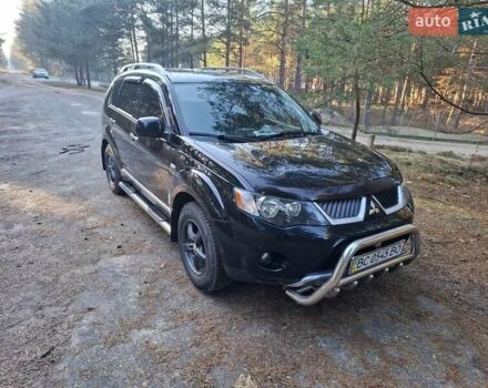 Черный Мицубиси Аутлендер ХЛ, объемом двигателя 2.4 л и пробегом 127 тыс. км за 10500 $, фото 23 на Automoto.ua
