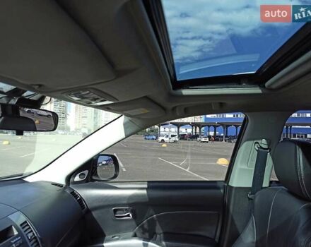 Черный Мицубиси Аутлендер ХЛ, объемом двигателя 2.4 л и пробегом 212 тыс. км за 9350 $, фото 2 на Automoto.ua