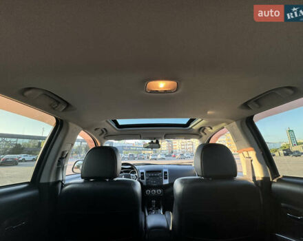 Черный Мицубиси Аутлендер ХЛ, объемом двигателя 2.36 л и пробегом 115 тыс. км за 12000 $, фото 20 на Automoto.ua